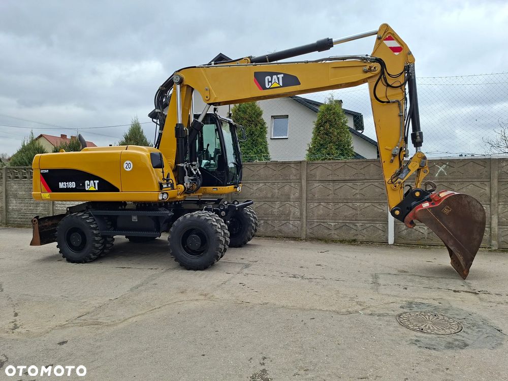 Caterpillar CAT M 318 D - 12