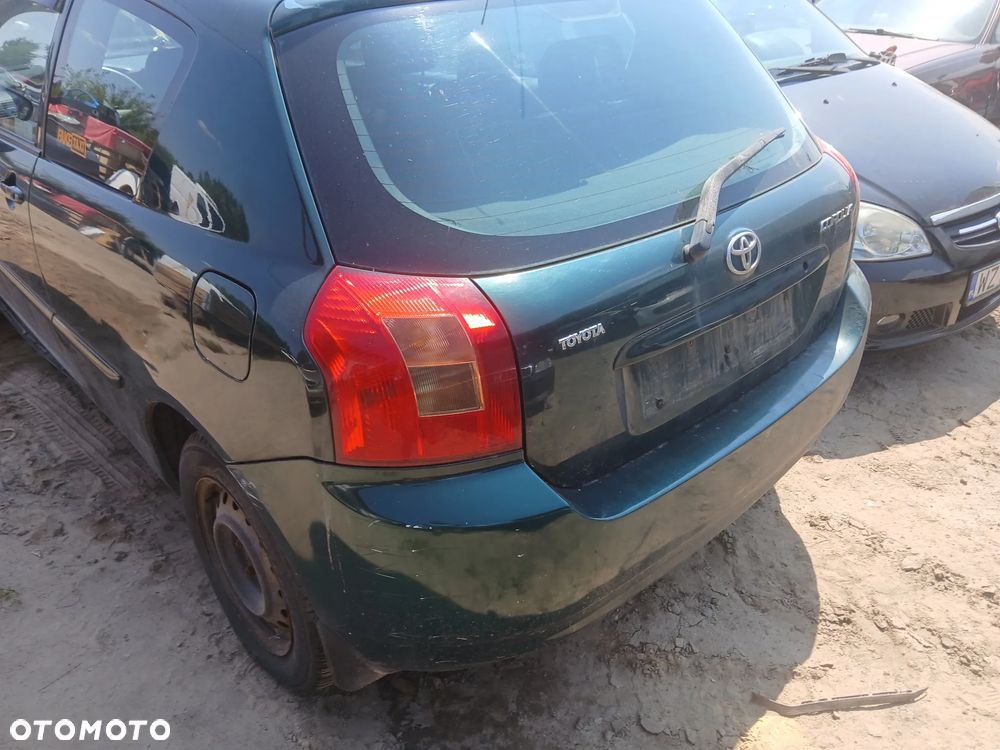 TOYOTA COROLLA HB e12 1.4 4ZZFE MTM  6R4 maska pokrywa silnika klapa bagażnika zderzak lampa reflektor pas przedni stop lampy halogeny przeciwmgłowe odblaski grill atrapa znaczek błotnik błotniki - 4