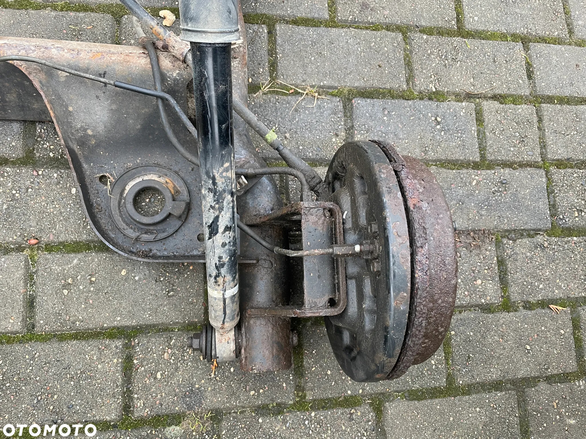 SUZUKI SWIFT III IV MK6 OŚ BELKA ZAWIESZENIA TYŁ 04- - 2