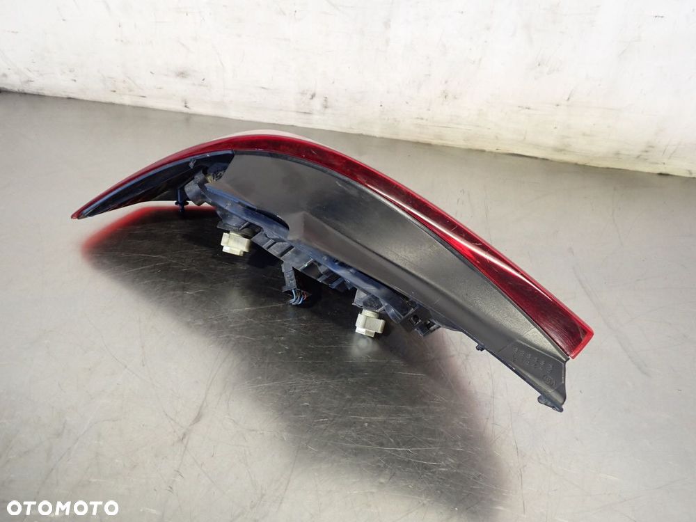 LAMPA PRAWA TYLNA DYMIONA OPEL CORSA D 89316522 - 5