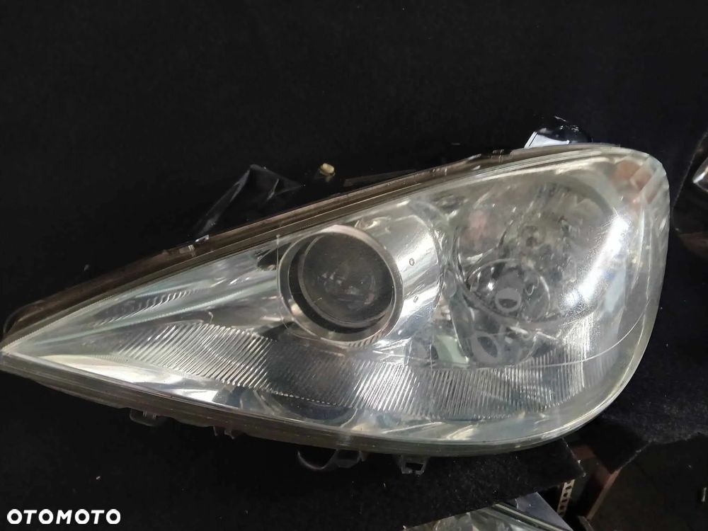 Peugeot 308 Lampa przednia lewa. - 2