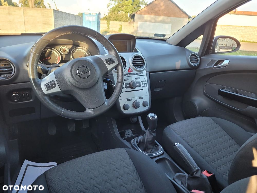 Opel Corsa 1.4 16V Enjoy - 11