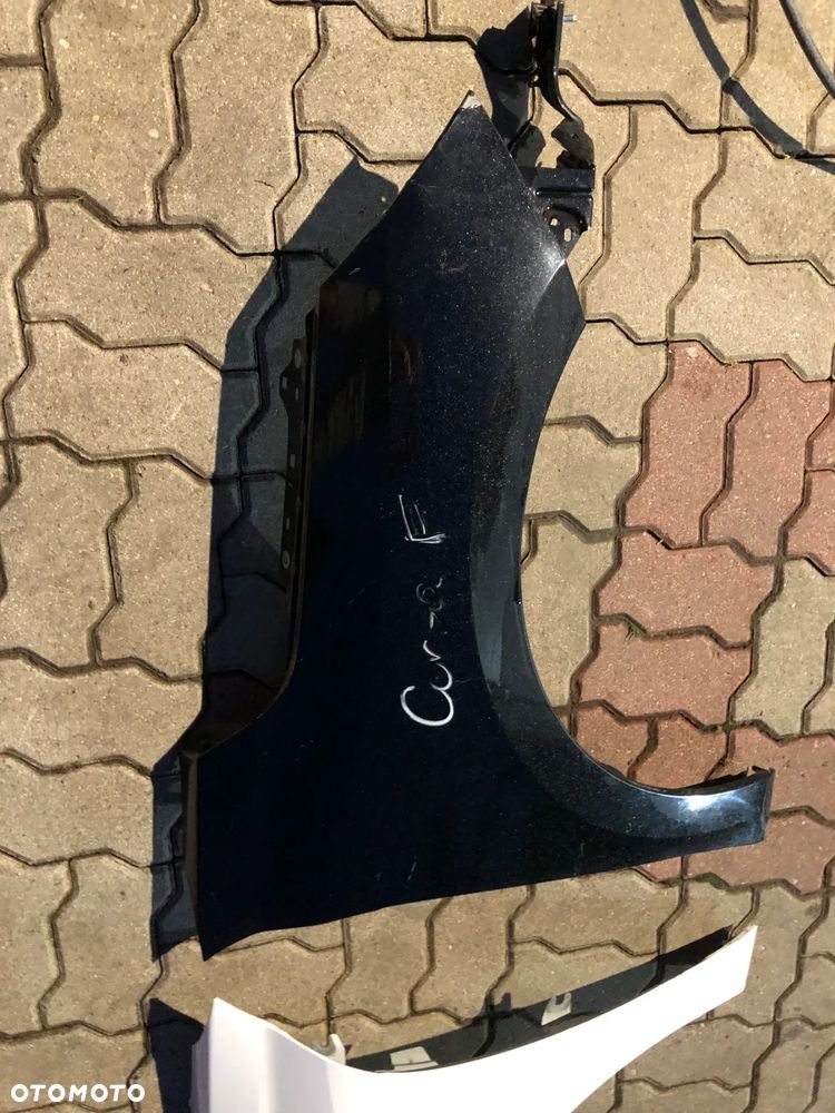 blotnik prawy przedni Opel Corsa F rok 19- - 3