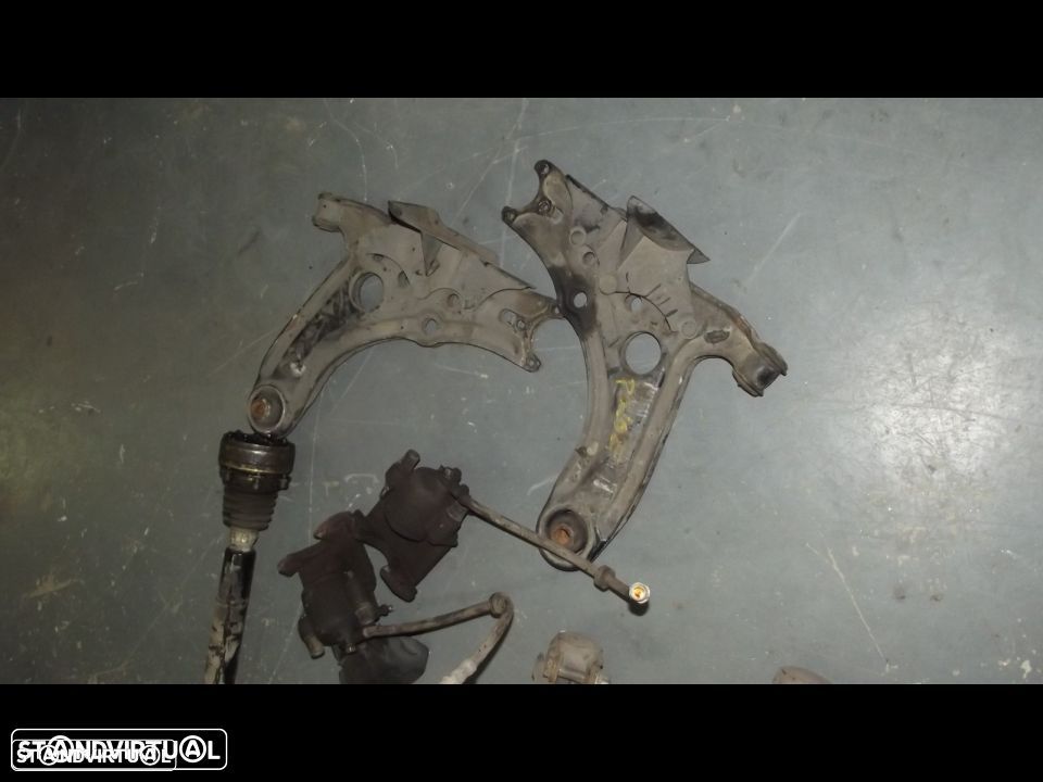 vw polo tranmissoes amortecedores c/mola e braços de suspenção - 3