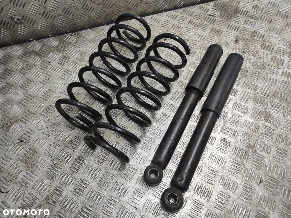 AMORTYZATORY TYŁ SPRĘŻYNY VOLVO 850 I - 1