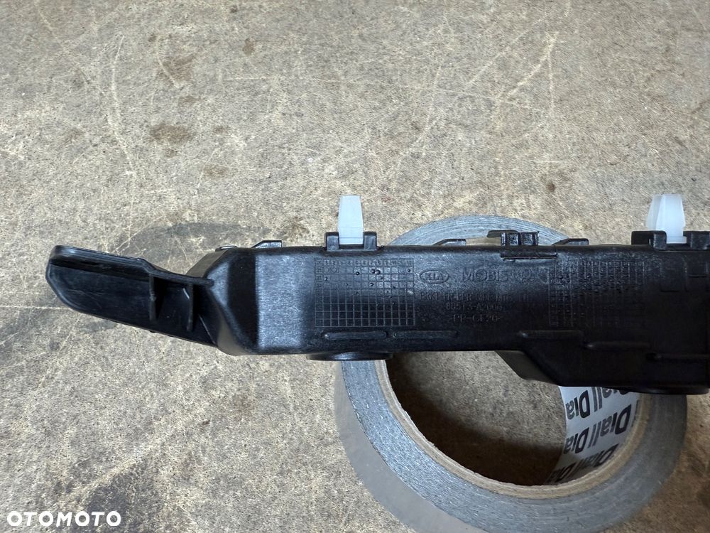 KIA CEED II 12-18 ŚLIZG MOCOWANIE BŁOTNIKA ZDERZAKA LEWY PRZÓD 86513-A2000 - 2