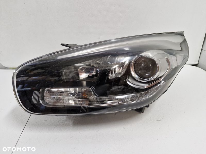 KIA CARENS 4 IV LAMPA LEWY PRZÓD LEWA PRZEDNIA REFLEKTOR SOCZEWKA UK - 1