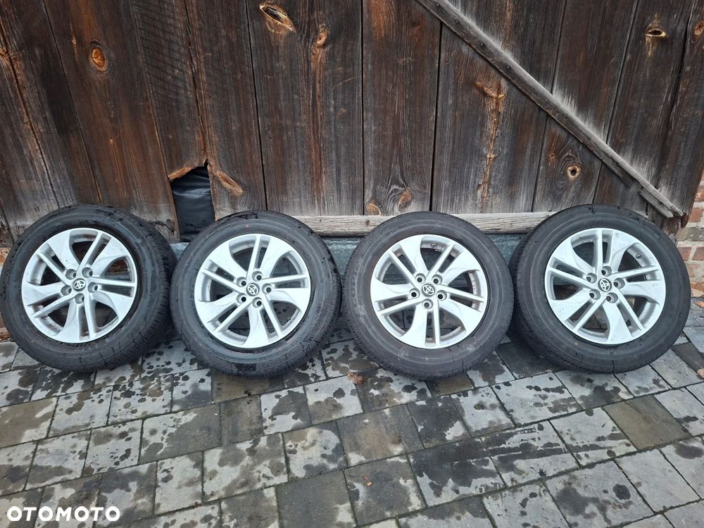 Koła Felgi Toyota OE YARIS 6.0" x 15" 5x100 ET 45 opony 23r - 1