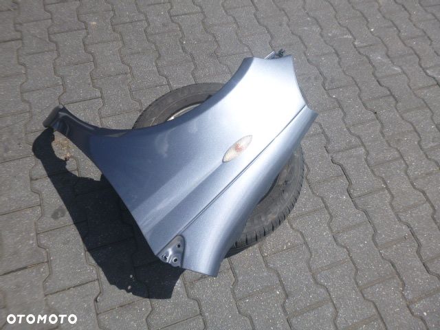 BŁOTNIK LEWY PRZÓD LEWY PRZEDNI TOYOTA YARIS I LIFT KOLOR 855 - 7