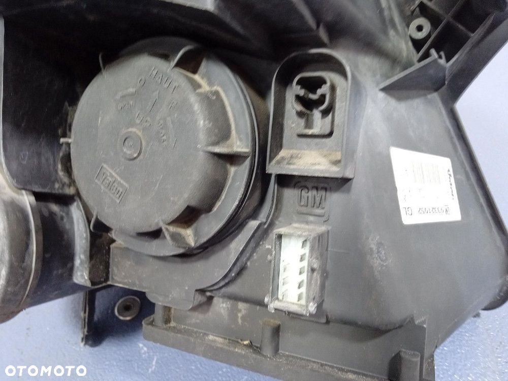 OPEL MERIVA A REFLEKTOR LEWY LAMPA EU 93321052 - 7