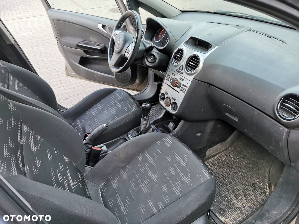 Opel Corsa 1.2 16V Enjoy - 11