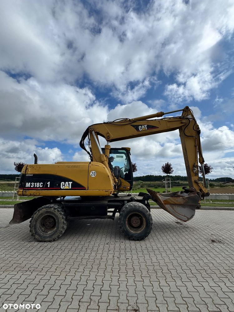 Caterpillar 318C - 7