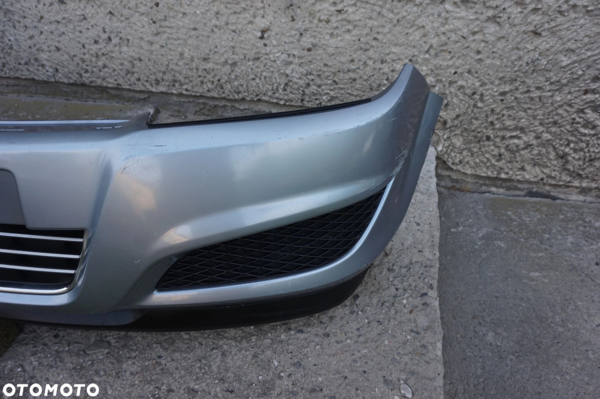 ZDERZAK PRZEDNI OPEL ASTRA III H LIFT 07/10r - 7