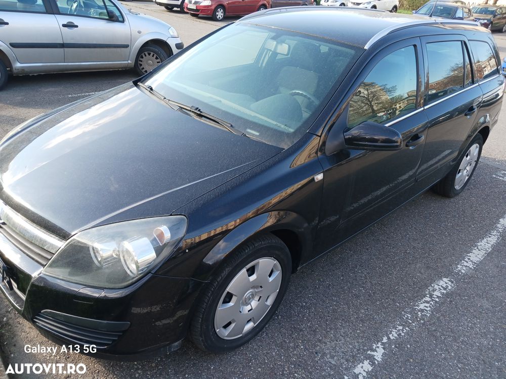 Opel Astra 1.9 CDTI Caravan Elegance - 1