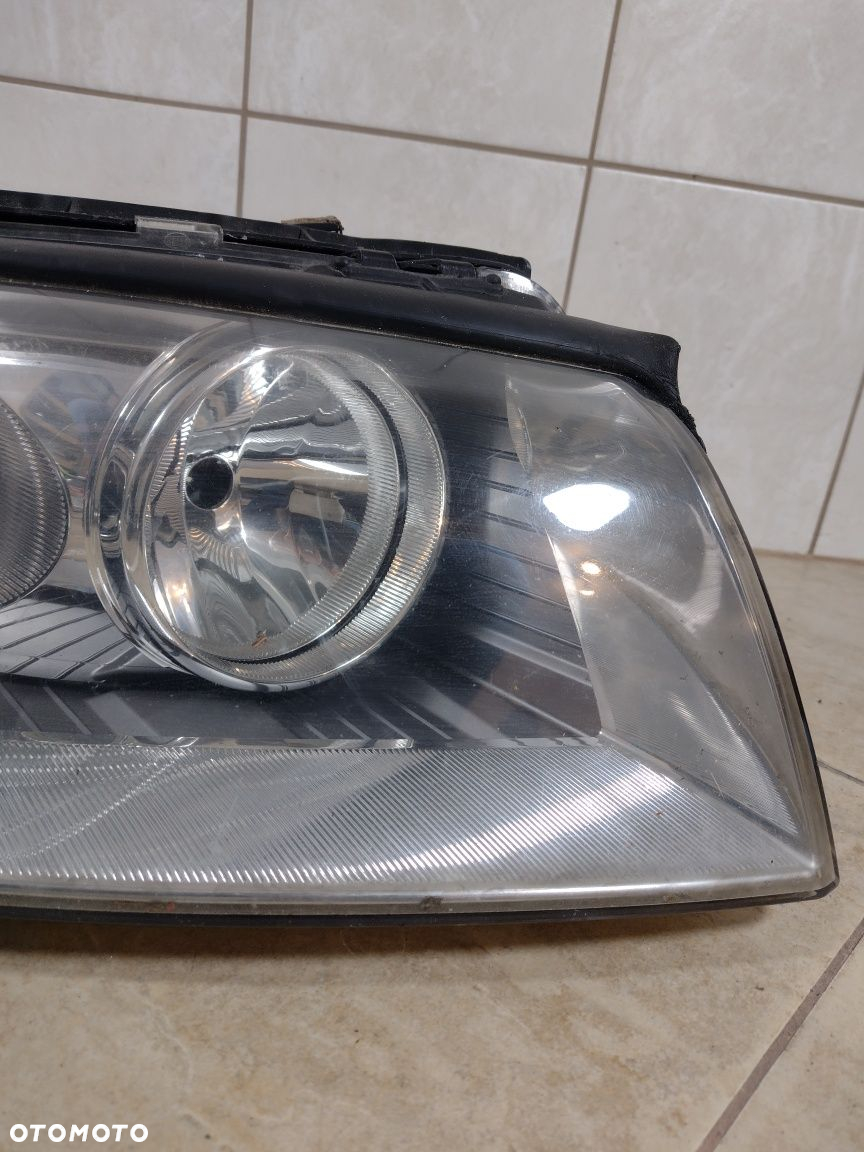 Reflektor lampa Audi A6 C6 04-08h1 H7 prawy przód oryginał zwykła - 5