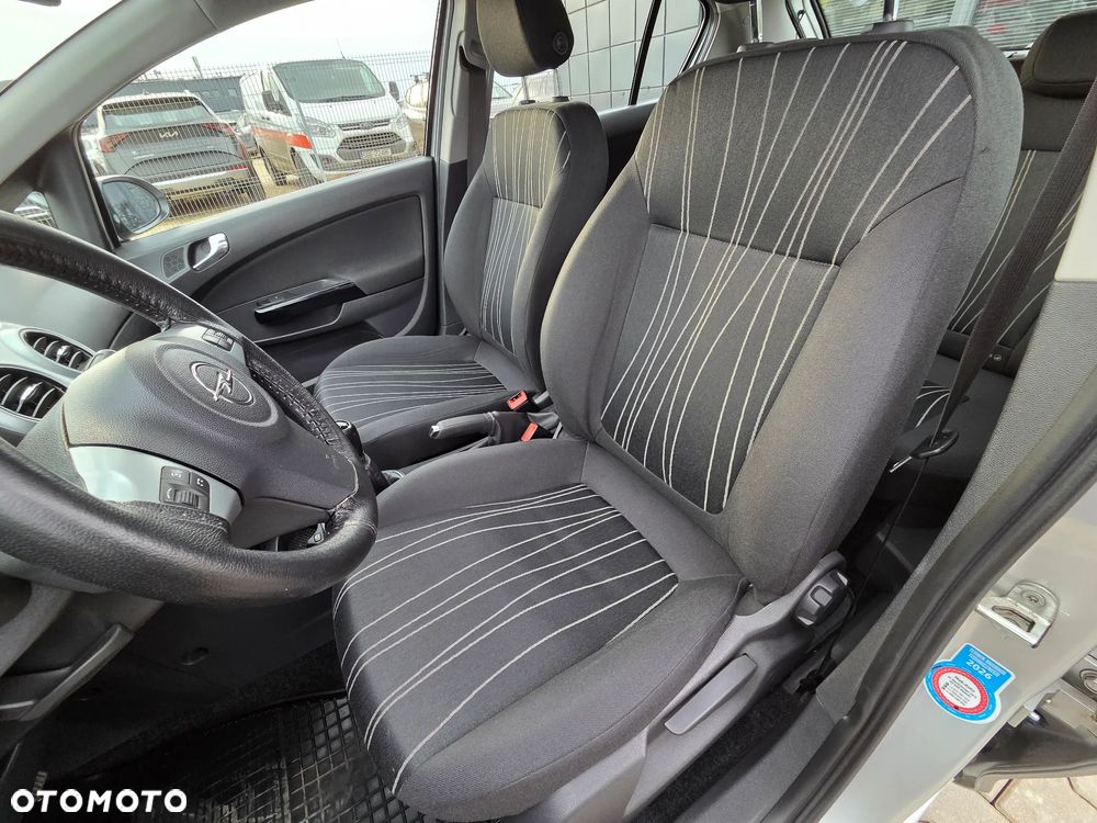 Opel Corsa 1.2 16V Enjoy - 25