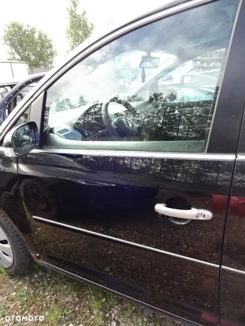 Prawe przednie drzwi VW Touran ,LC9Z - 1