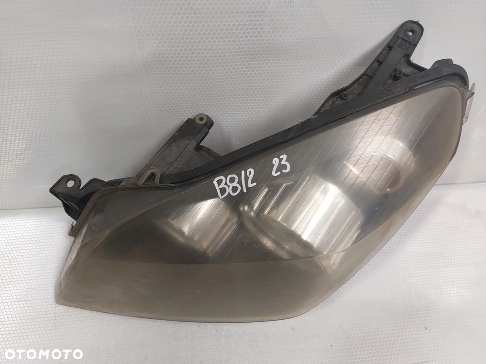 .  LAMPA PRZOD PRZEDNIA LEWA OPEL ASTRA H - 2