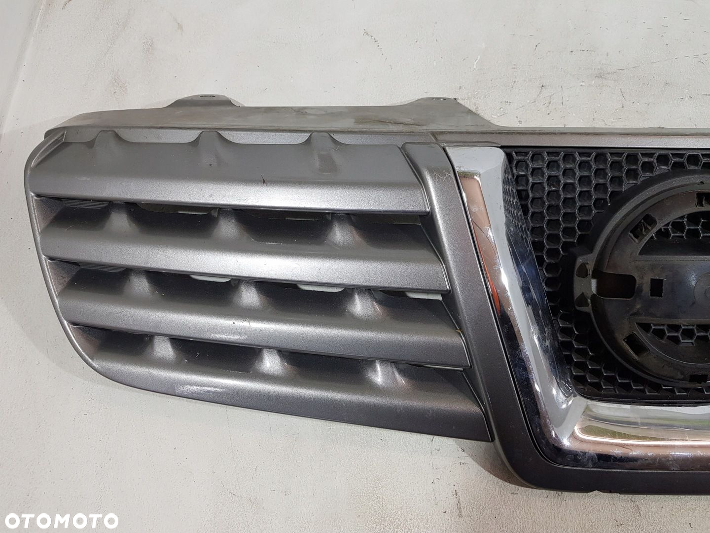 GRILL ATRAPA ZDERZAKA PRZÓD 62310-JD00B NISSAN QASHQAI J10 06-10 - 2