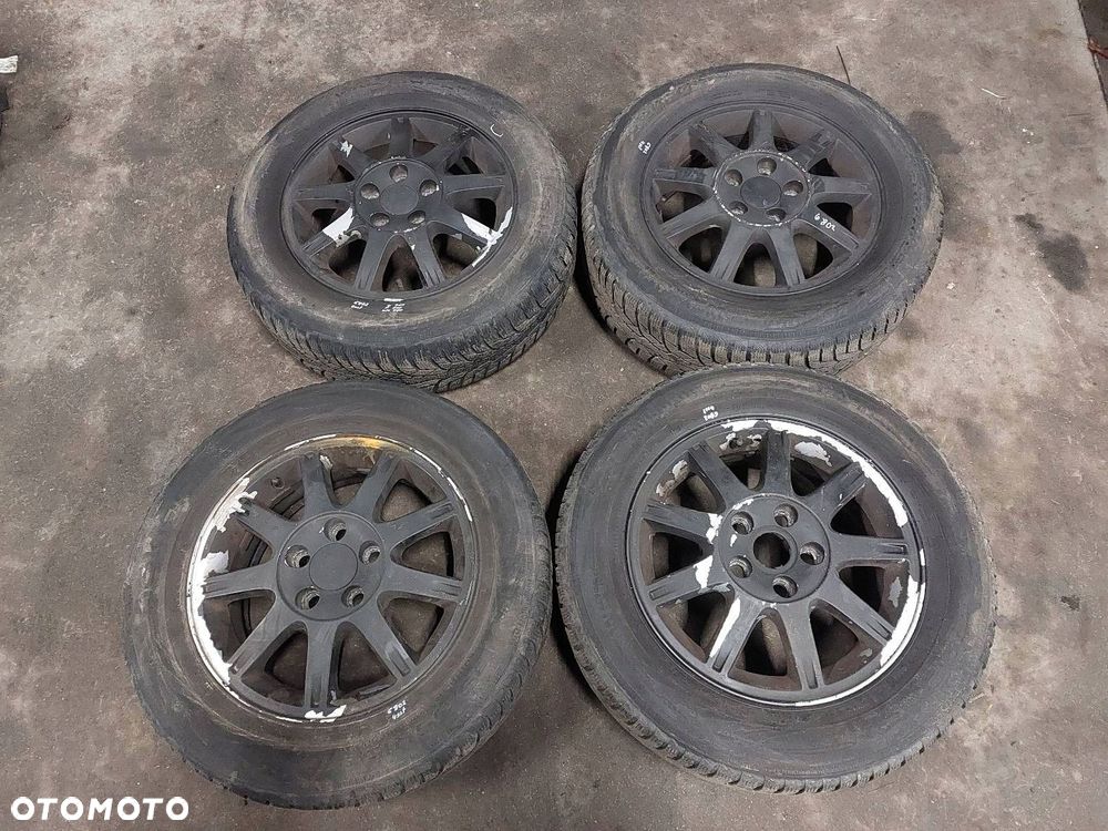 FELGI ALUMINIOWE 4 SZT KOMPLET 5x108 6Jx15 ET52,5 FI63,4 4M51-KB FORD - 1