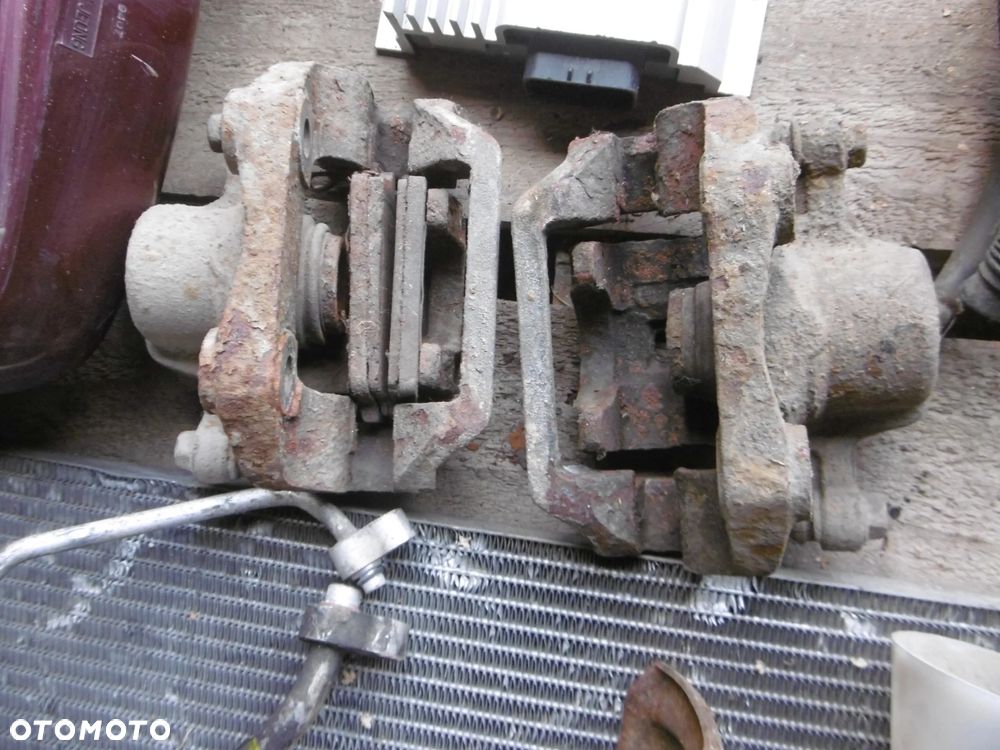 ZACISK HAMULCOWY TYLNY DAEWOO MUSSO 2.9TD - 2
