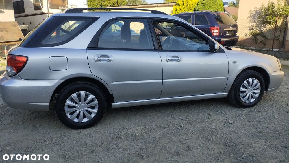 Subaru Impreza 1.6 TS - 13