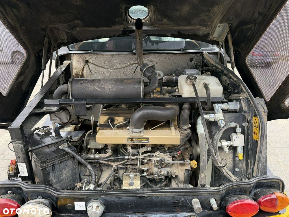 JCB 406 - 5