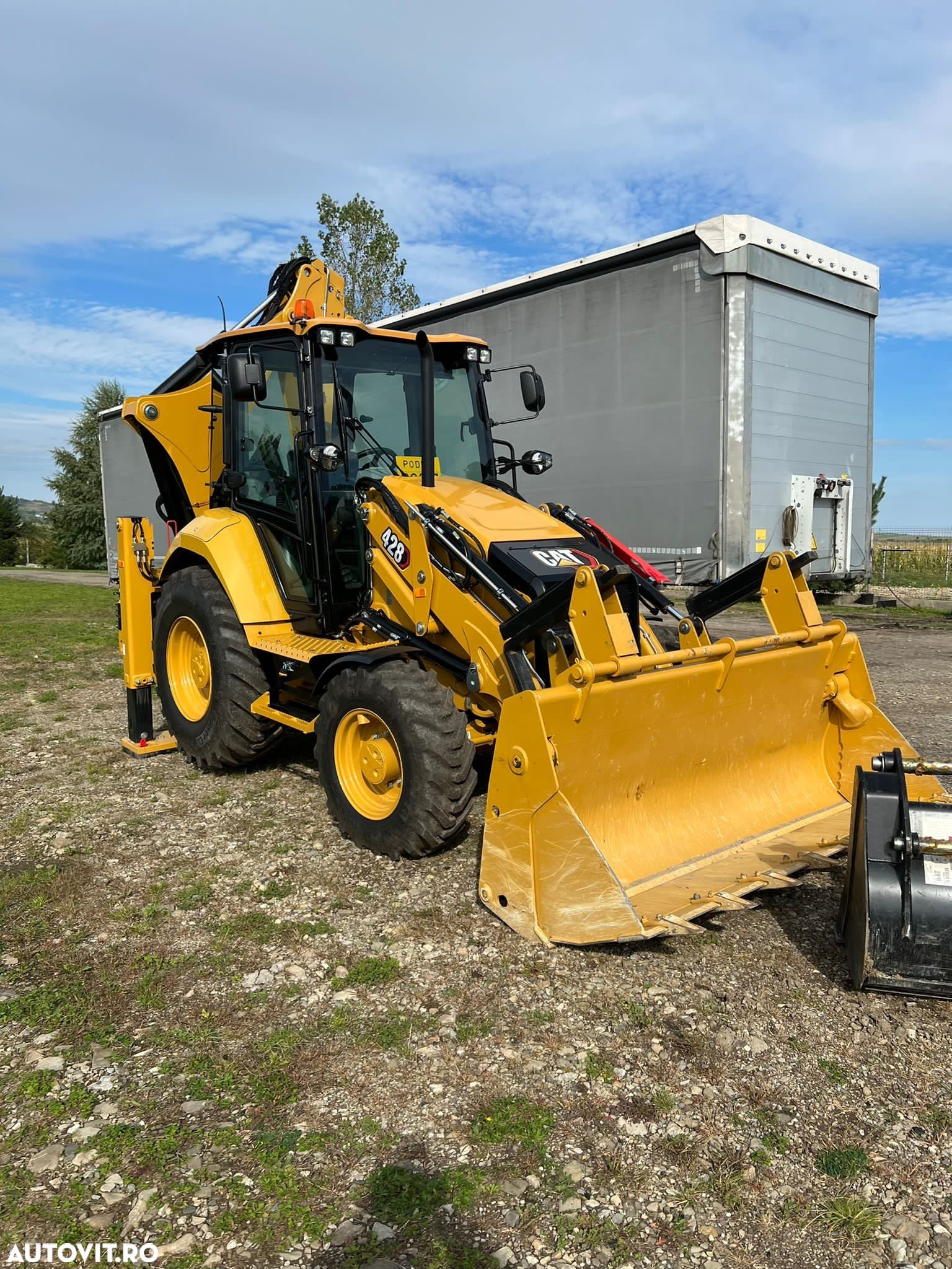 Caterpillar 428 - 1