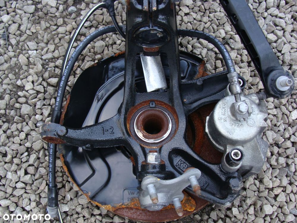 amortyzator zwrotnica lewa vw taigo kamiq arona 2q0413031dr - 5