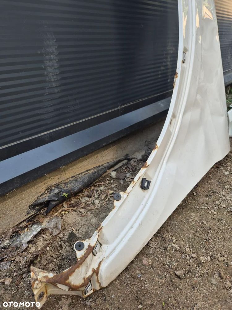 BŁOTNIK SANTA FE III 12r LEWY PRZÓD BIAŁY - 3