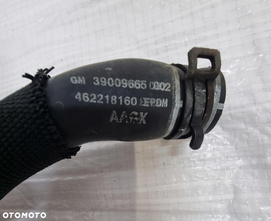 Opel Corsa E 1,4 Przewód wąż wody 39009665 - 3