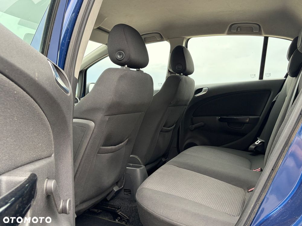 Opel Corsa 1.2 16V Enjoy - 23
