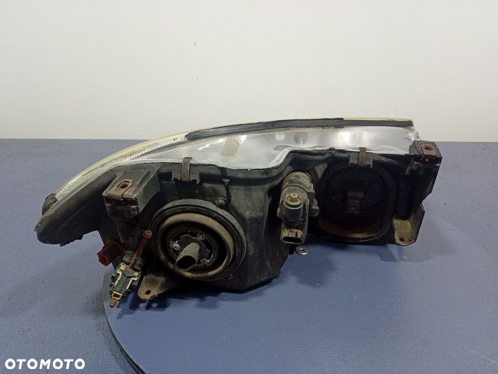 CHRYSLER 300M REFLEKTOR LEWY LAMPA EU 04780003AC - 3