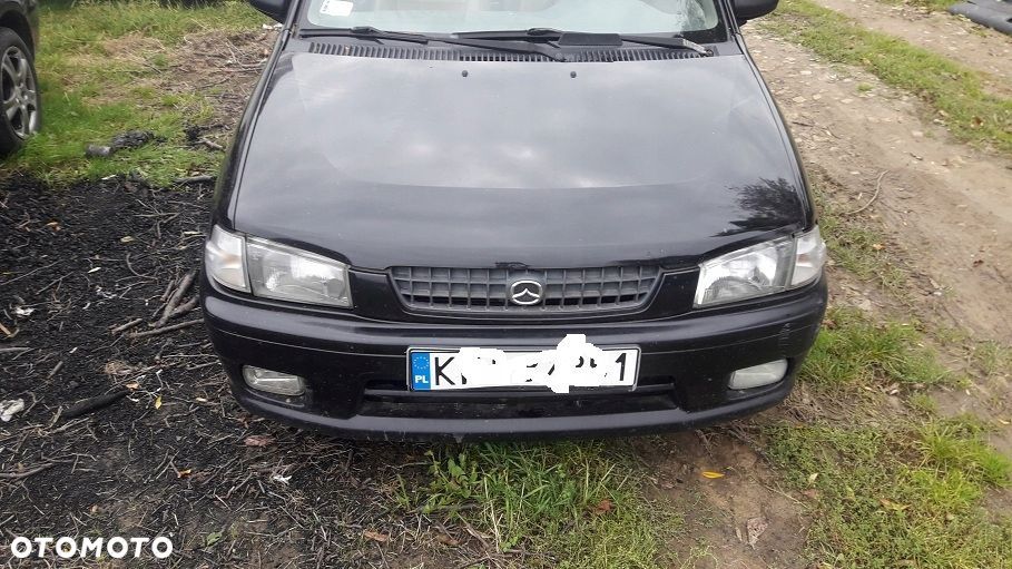 Mazda Demio 97-03 Lampa przednia przód  Lewa
