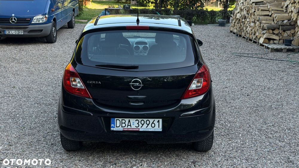 Opel Corsa 1.4 16V Active - 30
