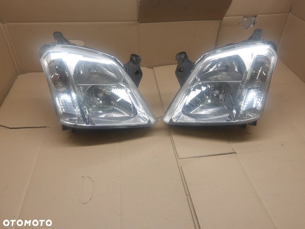 OPEL MERIVA A I LIFT 05-10 1.4B LAMPA PRAWA LEWA PRZÓD PRZEDNIA 93321053 93321052 - 1