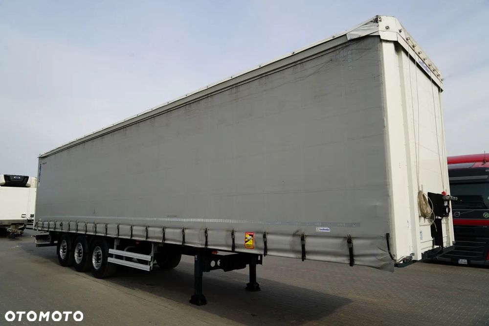 LeciTrailer FIRANKA / STANDARD / MOCNA PODŁOGA SZYNA DESKA / OŚ PODNOSZONA / OPONY 100%  / OSIE SAF - 9