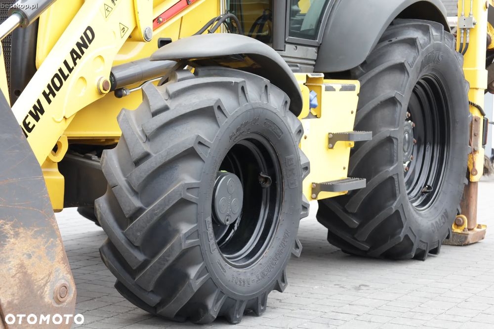 New Holland B100C - 21