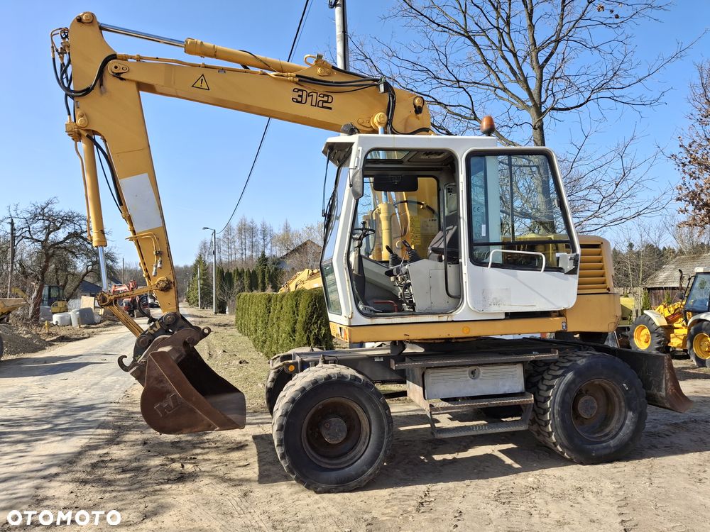 Liebherr A312 CAT JCB - 2