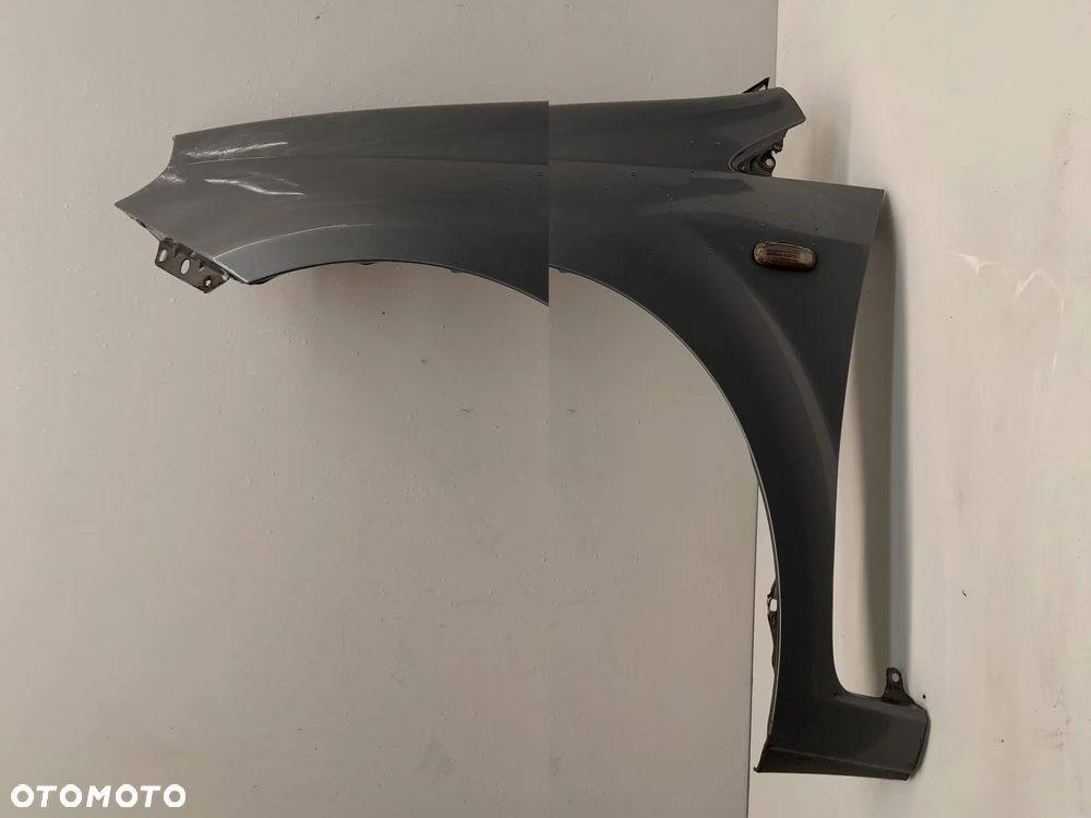 BŁOTNIK PRZÓD PRZEDNI LEWY FIAT GRANDE PUNTO 595/A SZARY - 1