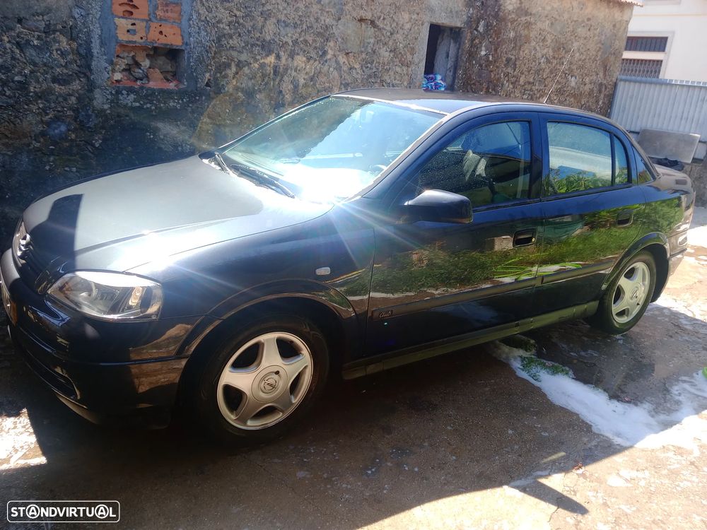 Opel Astra 1.4i 16V — fotografia 11