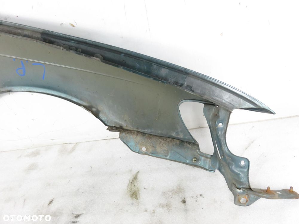 BŁOTNIK LEWY PRZEDNI TOYOTA COROLLA E10 LIFT - 2