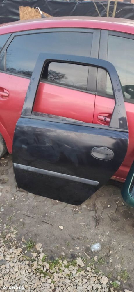 DRZWI LEWY TYŁ OPEL MERIVA A Z20R GOŁE CZARNE - 1