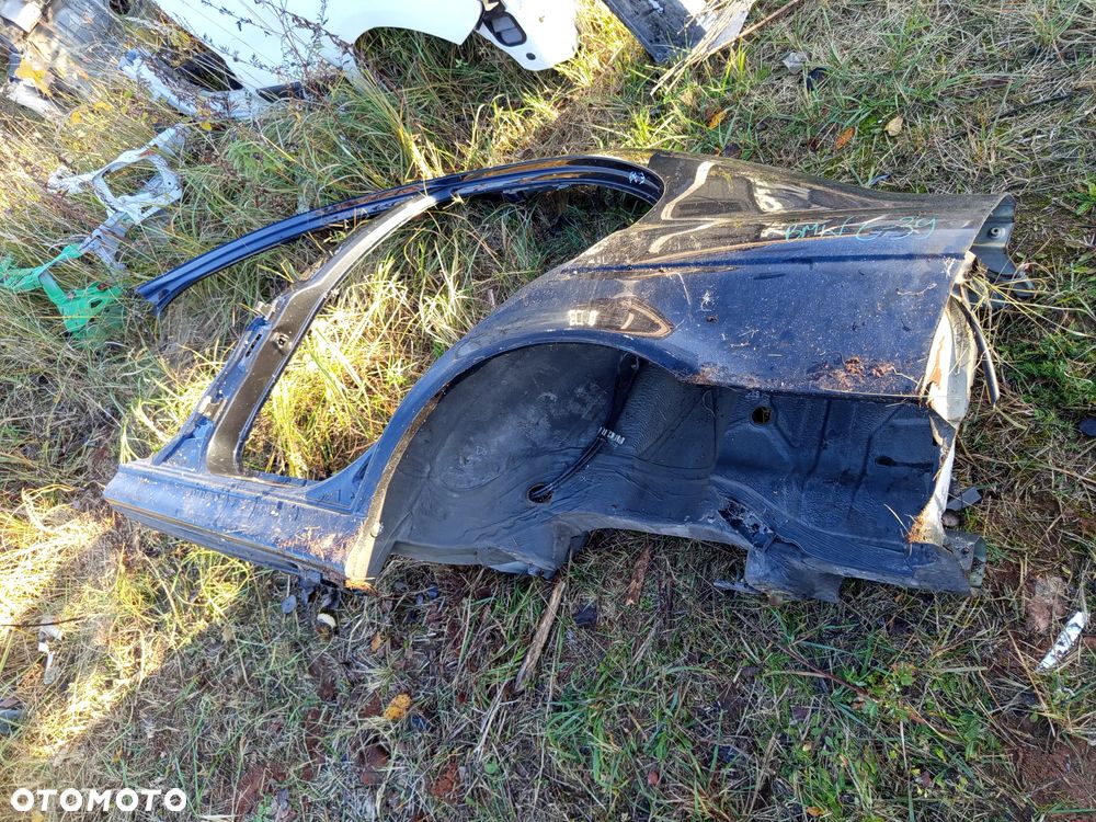 PRÓG BŁOTNIK LEWY TYLNY BMW E39 SEDAN - 1