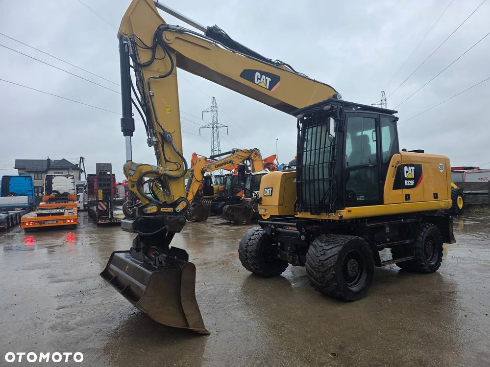 Caterpillar Cat M320F 7660 mtg z Niemiec Volvo Liebherr