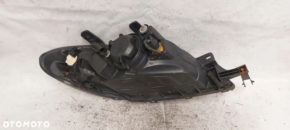 .  PRZOD PRZEDNIA LAMPA LEWA CHEVROLET LACETTI - 6