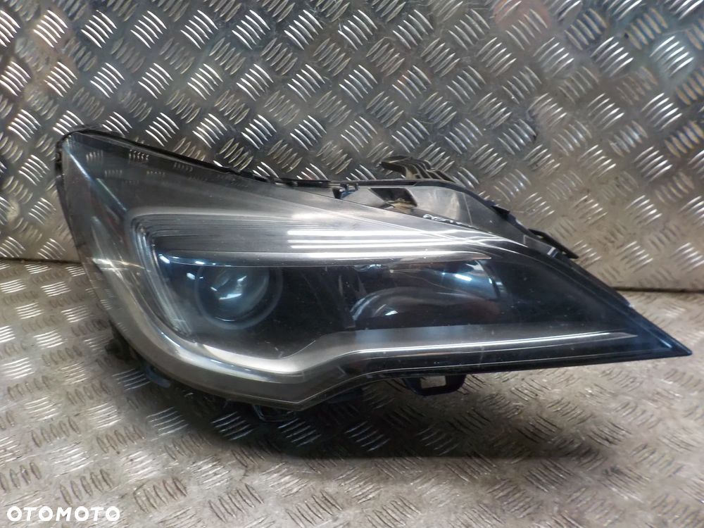OPEL ASTRA V K REFLEKTOR LAMPA PRAWY PRZÓD 13401144 ANGLIK