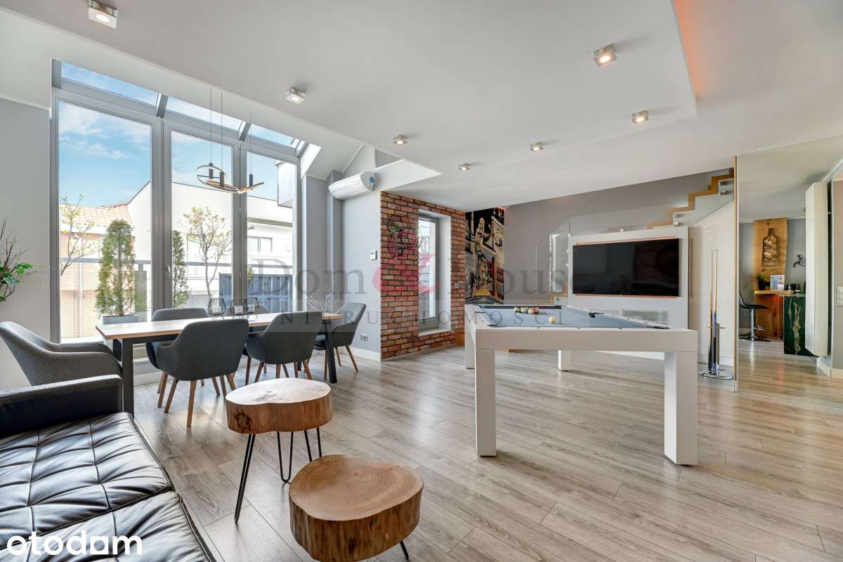 Dwupoziomowy apartament w inwestycji z basenem