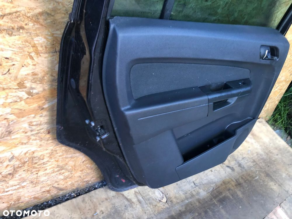 A56. Drzwi Lewy Tył Opel Zafira B Czarne 2006R (2005–2014) - Wysyłka - 8