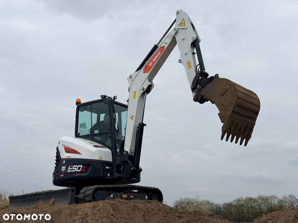 Bobcat Minikoparka Bobcat e50Z 5ton e55 e60 Cat 303.5 304  305 3xłyżki Ramię LOONG dodatkowe linie hydr wyjścia AUX1 + 2 przeciw waga MAX-dociążenie gąsienice 85% od nowości 1 właściciel z Niemiec Auto IDLEE po serwisie Widły wiertnica grabie i inne za dopłatą Szybkozłącze hydr Miller łyżka przedsiębierna Pług  Kubota Takeuchi Jcb - 24
